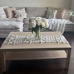Sofa for sale with table, blanket and cushions