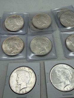 Lot of Bu peace silver dollars for sale