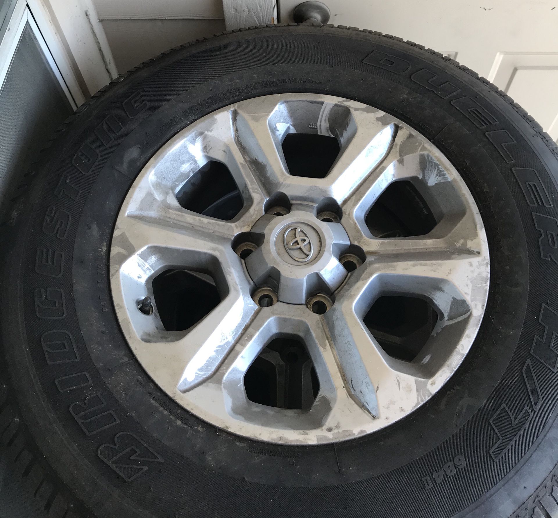 4 Bridgestone tires (under 2k miles) P265/ 70R17 / 113S
