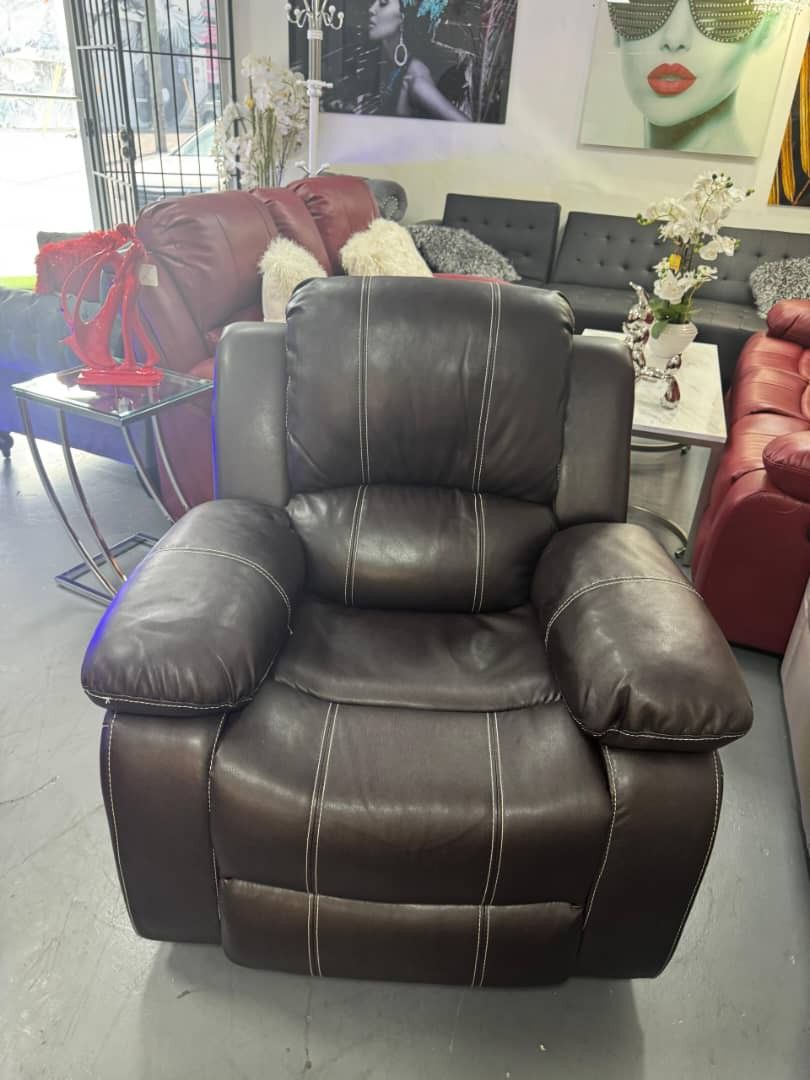 Rocking Recliner New. Downpyment $53