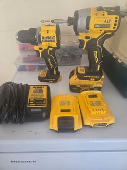 Dwelt drills comes with three batteries and two https://offerup.com/redirect/?o=ZHJpbGxzLk9uZQ== impact drill, new charger, the two small twenty volt.