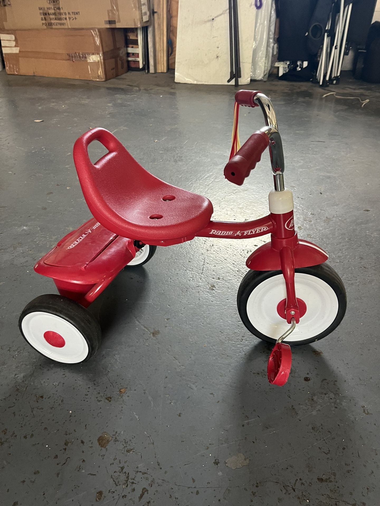 Red tricycle for kids
