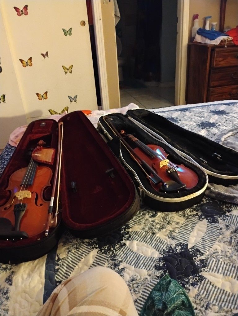 2 Violins And Cases