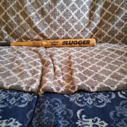 Louisville Slugger 125SB wooden softball bat. Louisville Slugger is a famous brand of baseball and softball equipment,
