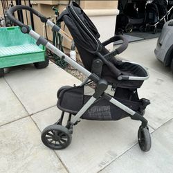 EvenFlo Xpand Double Stroller With Car seat 