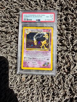 Sabrina’s Alakazam PSA 8 Holo Rare Pokemon Card