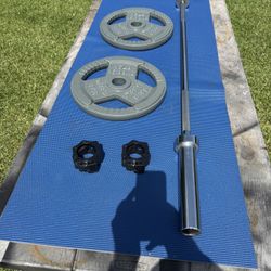 Set Including 5’ Olympic Bar And Pair Of 35 Pound Easy Grip Weights 