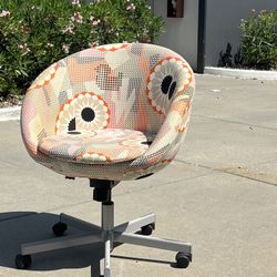 White Desk And Floral Chair. 