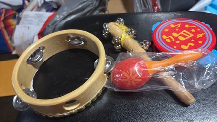 Instrument for young people to play tangerine shakers two shakers and two music to play