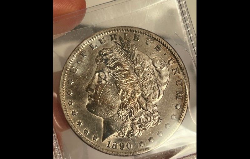 1890 cc Morgan Silver Dollar AU detailed