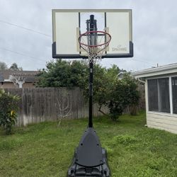 Spaulding  Basketball Hoop with a broken backboard