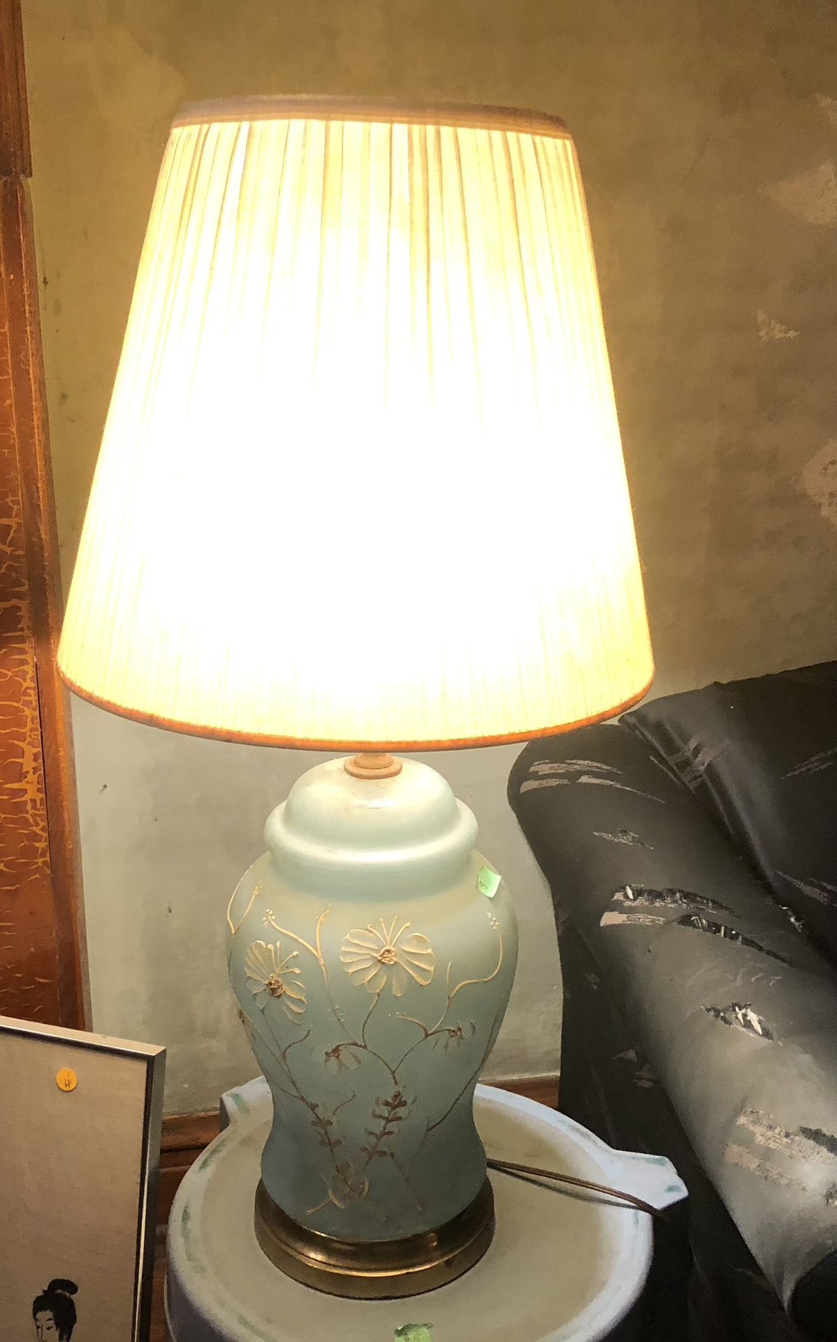 Two Blue Lamps With White Flowers