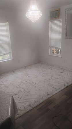 At Home 8x10 Woven Area Rug