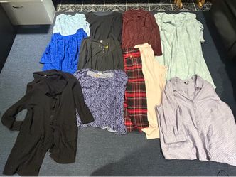 Variety of woman’s clothes in a size 3X