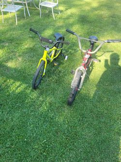 2 20" Kids Bikes (yellow has training Wheels)  good condition ($50 each)