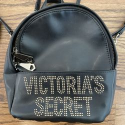Victoria's Secret Mini  Love Victoria 7" Backpack Black w/ Gold Color Details. Condition is pre owned and shows some light signs of wear from usage an