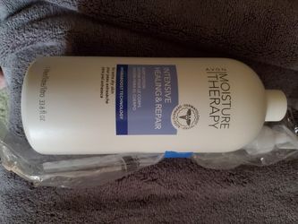 Avon Moisture Therapy Intensive Healing and repair body lotion 33 oz