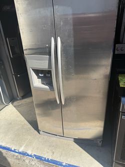 KitchenAid stainless steel side-by-side refrigerator with water and ice