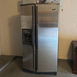 Very nice working garage refrigerator by whirlpool