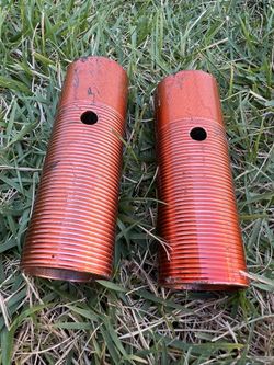 Orange metal bike pegs