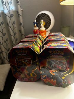 Mega Charizard X and Y tins