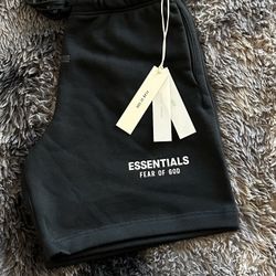 Essentials jet black with white letters shorts available in sizes small-xl ss25 newest model