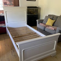White Stanley furniture twin bed frame with full storage drawers