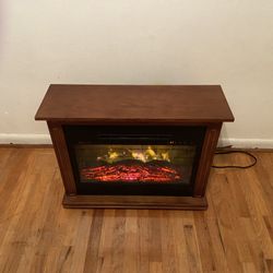 Heat Surge Roll N Go Electric Fireplace 