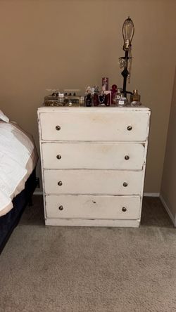 Distressed wooden dresser