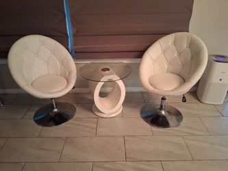 Leather chairs and table set