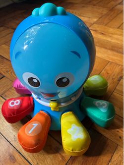 Toy octopus with music & sounds, new batteries included
