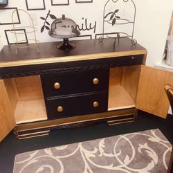  $180- (firm on price)1 Black and gold Vintage dresser! Lots of storage space behind each side door. H-2‘10“ X L 4 ft 4 1/2” X D 1‘7“  Could use a rep