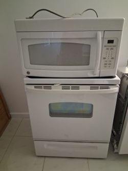 Glass stove , over range microwave and brand new dishwasher ALL $350