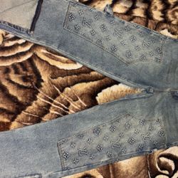These are Louis Vuitton denim carpenter shorts in blue.  