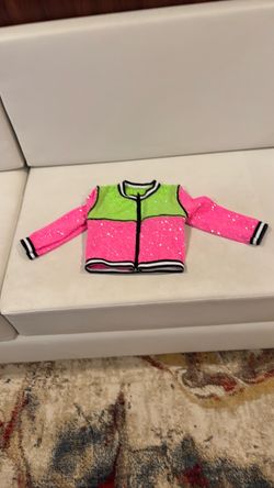 Green and pink performance jacket for kids
