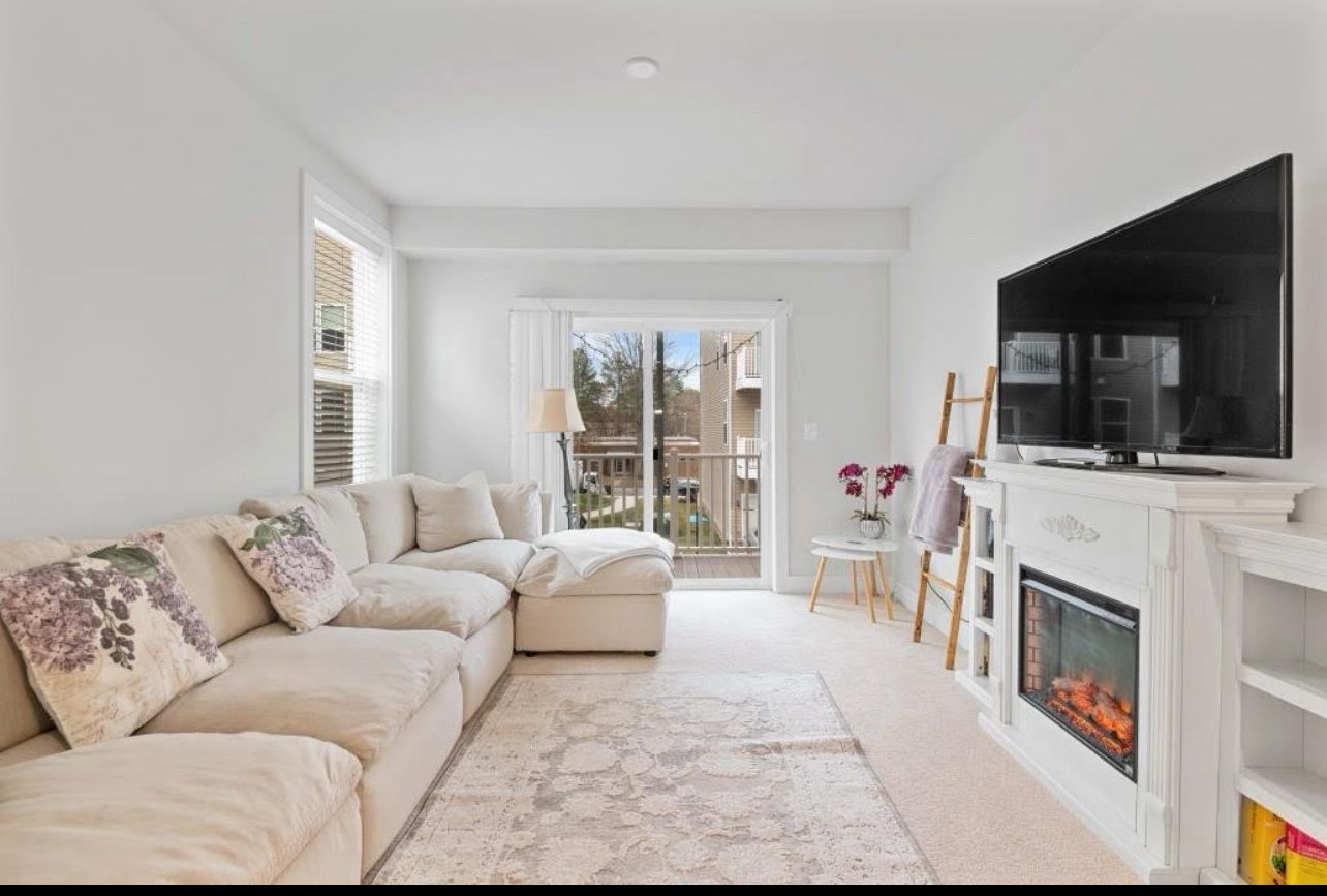 TV Stand With A Fireplace Heater And Bookshelves