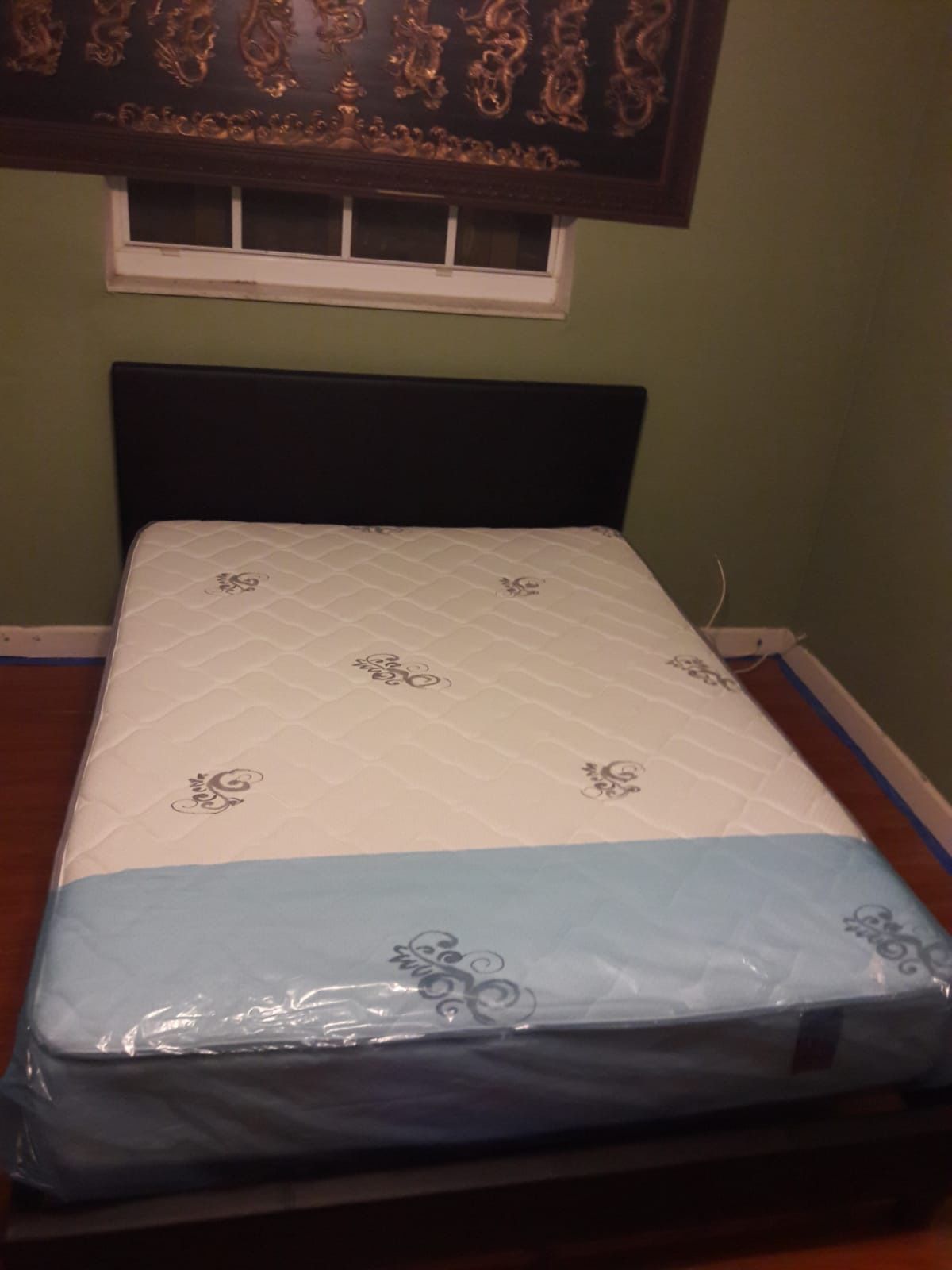 New queen bed frame and mattress included