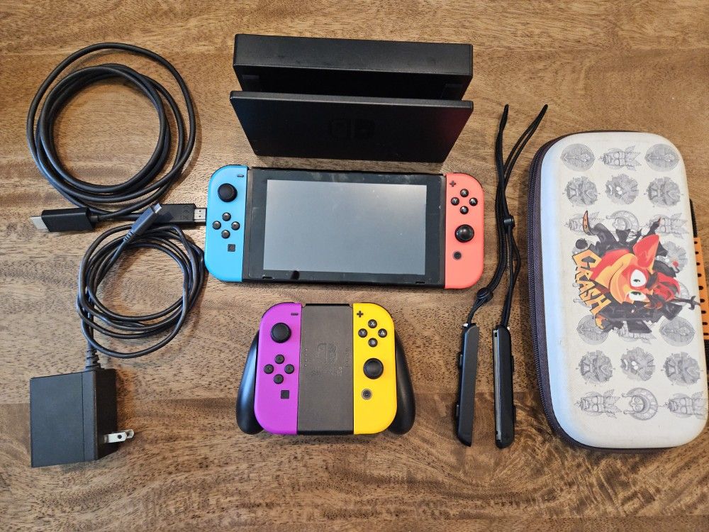 Nintendo Switch with 4 JoyCons and Crash Bandicoot Case