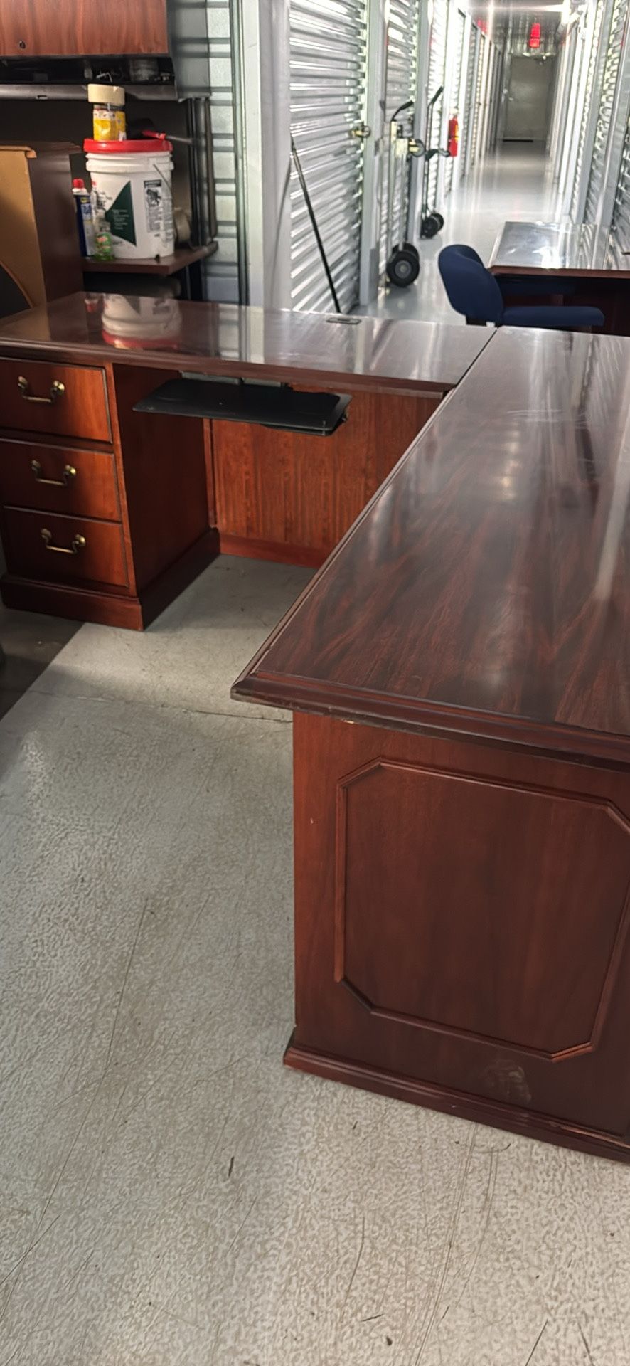 A Set Of An L Shaped Desk A Bookcase And A Filing Cabinet