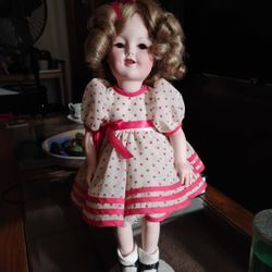 Porcelain Shirley Temple Doll.