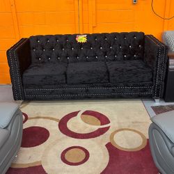 Black suede sofa