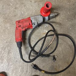 Milwaukee heavy duty corded, Roto hammer or drill works great