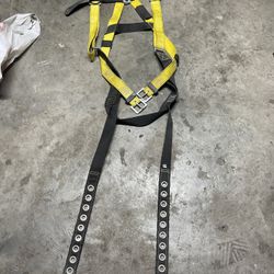 OSHA regulated extra large harness brand is guardian fall protection, fits extra large to 2X