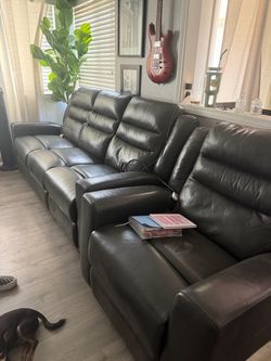 Gray leather couches almost New
