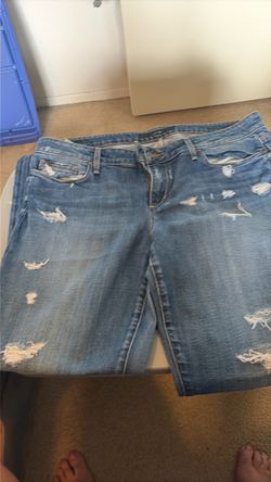 Distressed Light Wash Denim Jeans