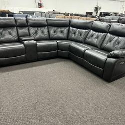 New Reclining Sectional.  Grey Or Brown Gel Leatherette.  110” X 98”.  Free Delivery!
