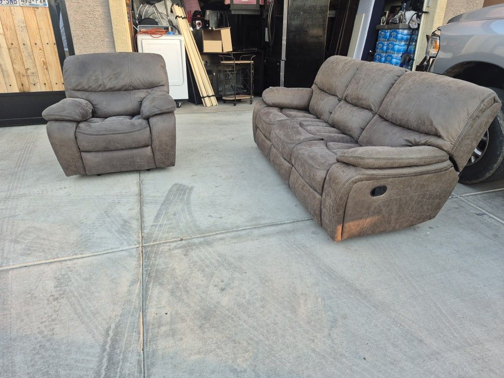 Two Pieces Recliner Leather Sofas In Very Good Condition
