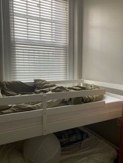 Twin Low loft bed with barely used mattresses