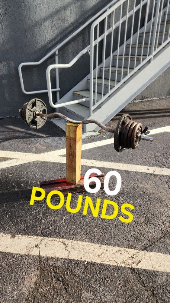 $100 Used Weight Plates 100POUNDS + used Curl Bar. Delivery fee