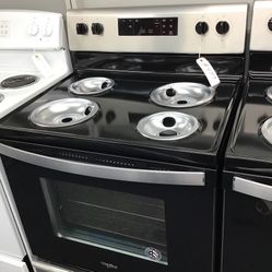 Whirlpool Coil Top Black And Stainless And Range. 1 year Warranty 